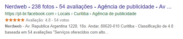 Resultado da pesquisa da empresa NerdWeb no Google aparecendo em rich snippets.